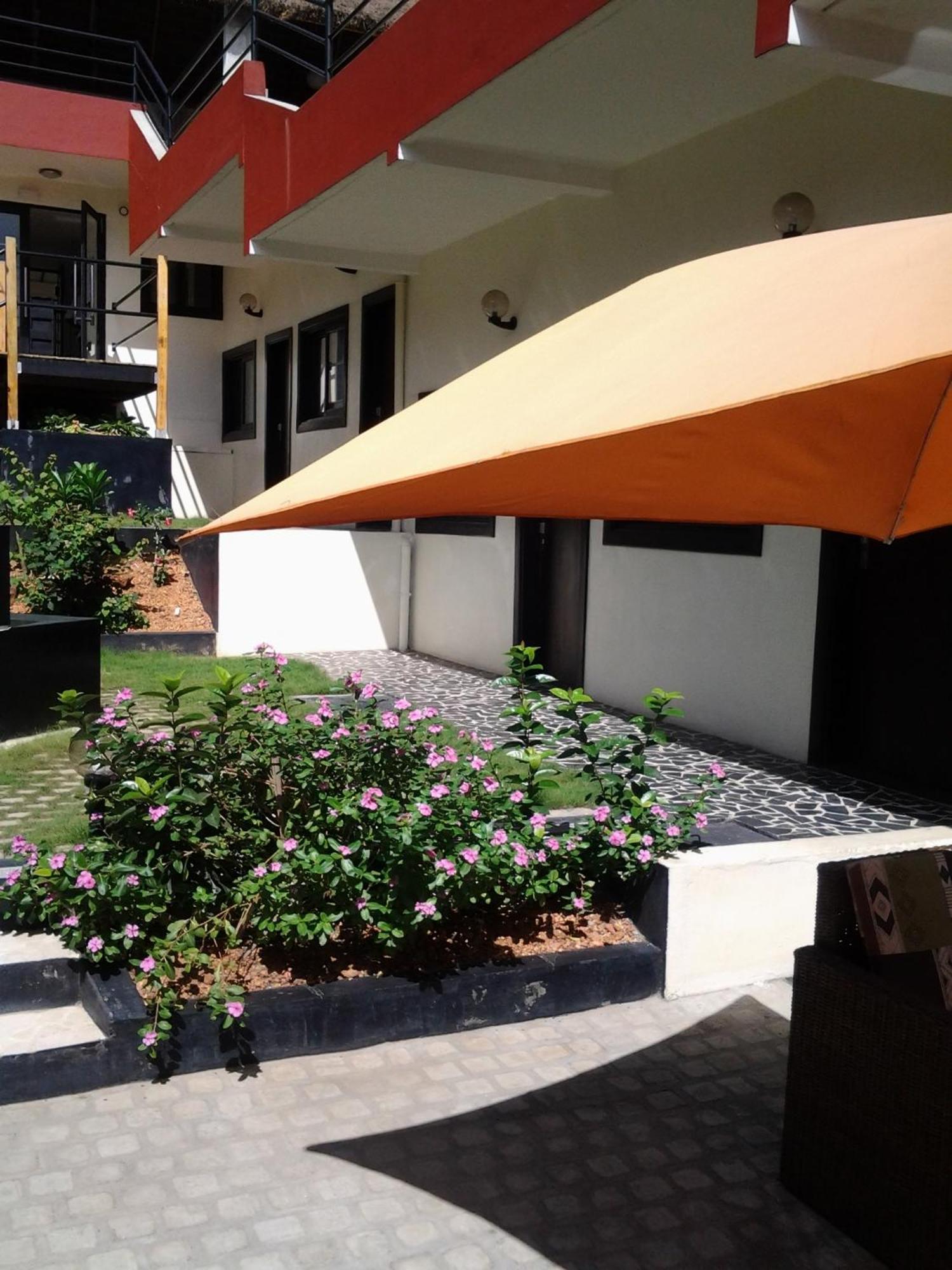 Détente Hôtel Abiyán Exterior foto